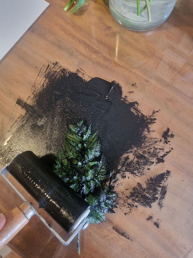 Rolling the ink onto leaves